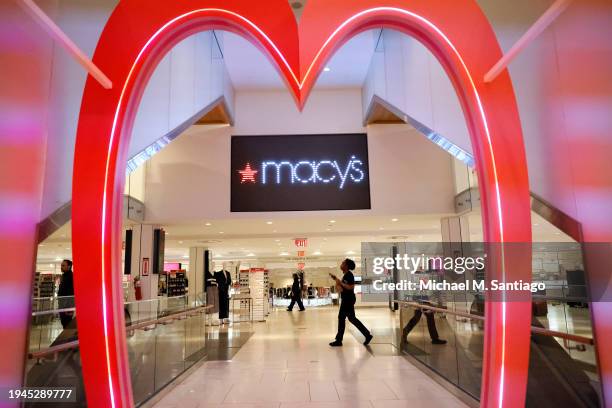 The Macy's company logo is seen at the Macy's store on Herald Square on January 19, 2024 in New York City. Macy's department-store chain announced...