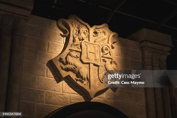 The Hogwarts school logo is seen at the "Harry Potter The Exhibition" on January 19, 2024 in Barcelona, Spain.