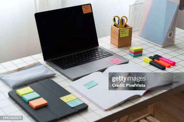 laptop computer sitting on top of desk - project management tool stock pictures, royalty-free photos & images