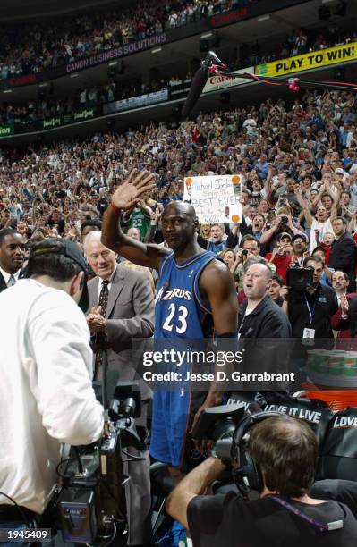 Michael Jordan of the Washington Wizards waves to the fans before the last game of his career, which happened to be against the Philadelphia 76ers,...
