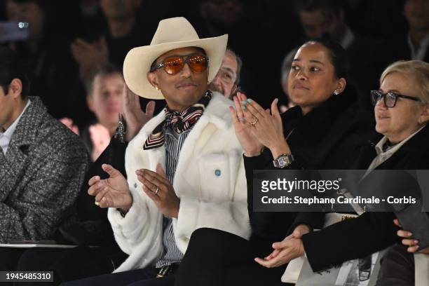 Pharrell Williams and Helen Lasichanh attend the Dior Homme Menswear Fall/Winter 2024-2025 show as part of Paris Fashion Week on January 19, 2024 in...