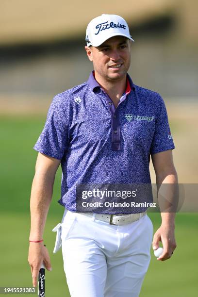 Justin Thomas of the United States reacts on the 12th green during the second round of The American Express at Nicklaus Tournament Course on January...