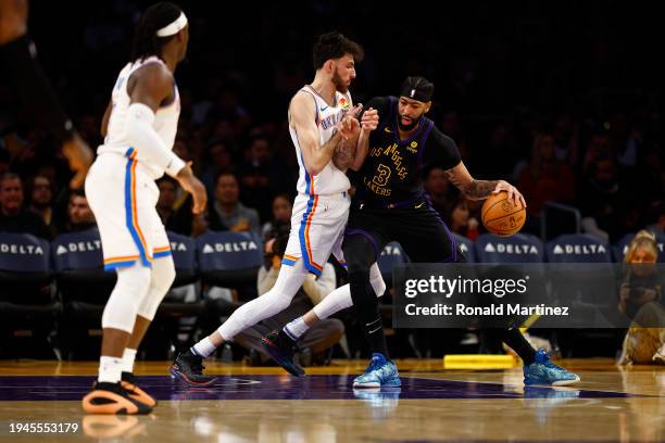 Chet Holmgren of the Oklahoma City Thunder and Anthony Davis of the Los Angeles Lakers in the second half at Crypto.com Arena on January 15, 2024 in...