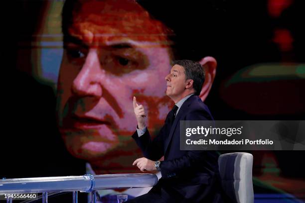 Italian senator Matteo Renzi guest of the television program Porta a Porta. In the background the image of the leader of the 5 Star Movement Giuseppe...