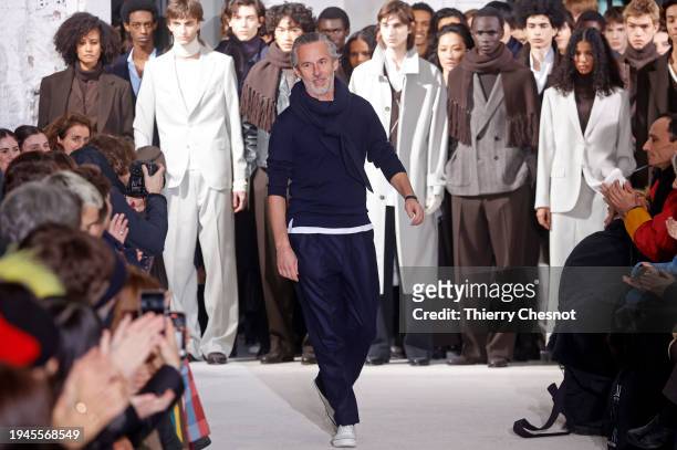Fashion designer, Pierre Maheo acknowledges the audience at the end of the Officine Generale Menswear Fall/Winter 2024-2025 show as part of Paris...