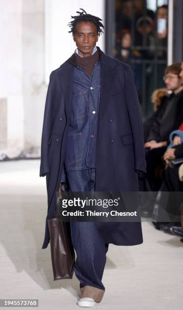 Model walks the runway during the Officine Generale Menswear Fall/Winter 2024-2025 show as part of Paris Fashion Week on January 19, 2024 in Paris,...