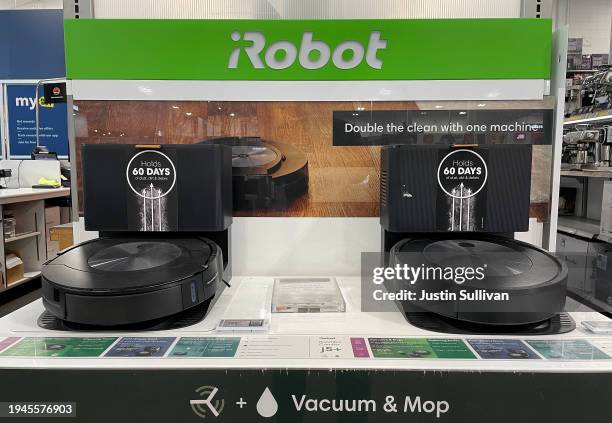 Roomba vacuums by iRobot are displayed at Best Buy store on January 19, 2024 in San Rafael, California. The European Commission, the EU’s antitrust...