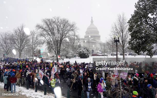 People attend the annual March for Life rally on the National Mall on January 19, 2024 in Washington, DC. Amidst snow and freezing temperatures...