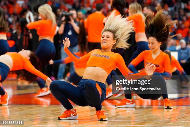 The Syracuse Orange Dance Team performs during the first half of the College Basketball game between the Miami Hurricanes and the Syracuse Orange on...