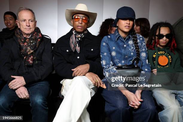 Michael Burke, Pharrell Williams, Rocket Williams and Helen Lasichanh attend the Kenzo Menswear Fall/Winter 2024-2025 show as part of Paris Fashion...