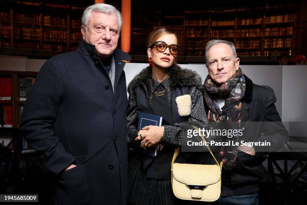 Sidney Toledano, Rita Ora and Michael Burke attend the Kenzo Menswear Fall/Winter 2024-2025 show as part of Paris Fashion Week on January 19, 2024 in...