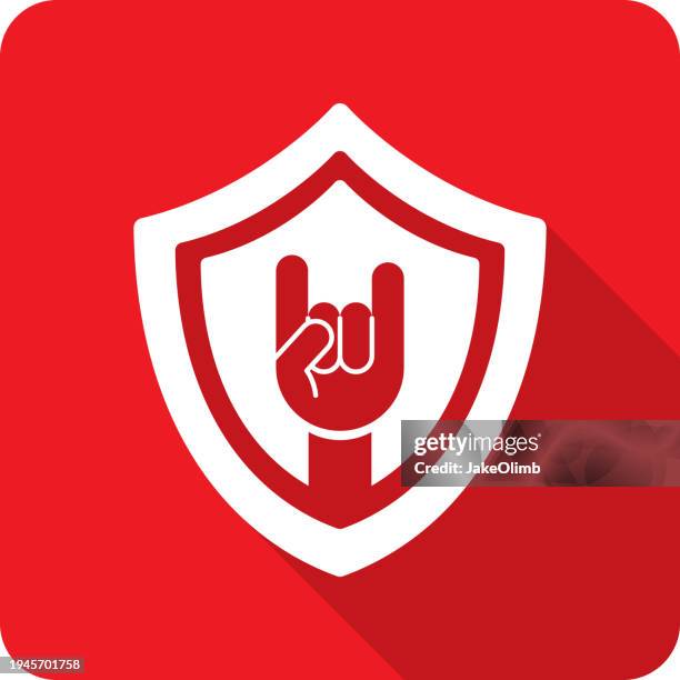 shield rock n roll hand icon silhouette - classic rock stock illustrations