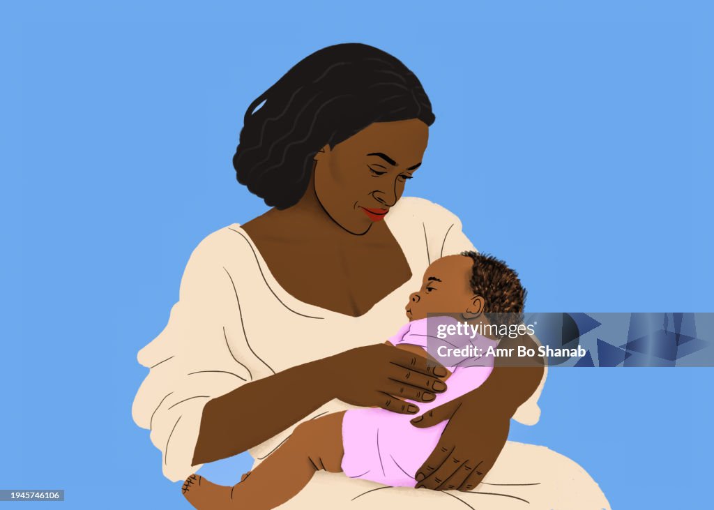 A woman holding a baby