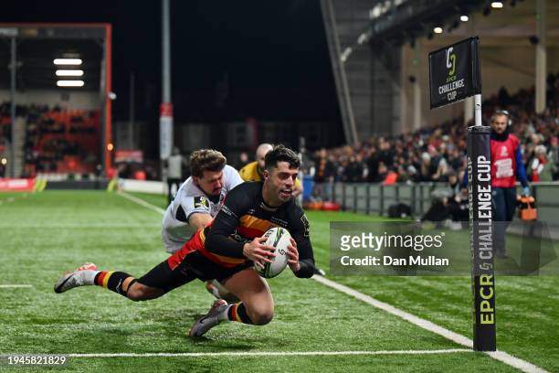 Adam Hastings of Gloucester Rugby goes over the line to score his fourth try during the EPCR Challenge Cup match between Gloucester Rugby and Castres...