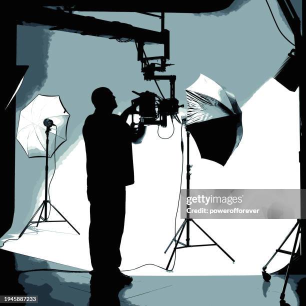 printmaking style illustration of camera operator working behind the scenes while filming on a film set - video crew stock illustrations