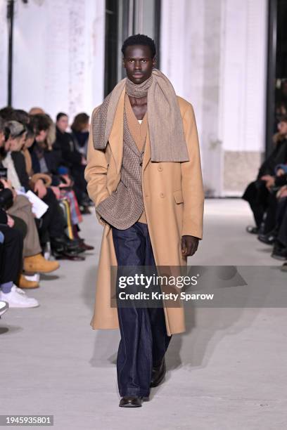 Model walks the runway during the Officine Generale Menswear Fall/Winter 2024-2025 show as part of Paris Fashion Week on January 19, 2024 in Paris,...