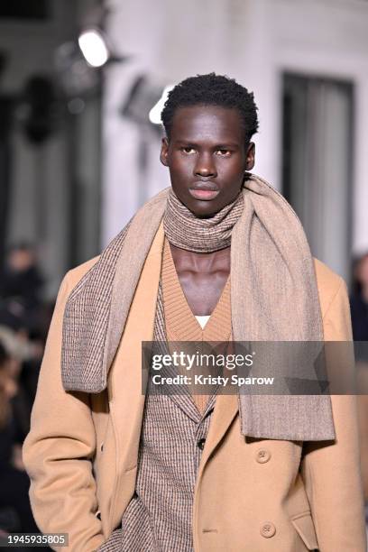 Model walks the runway during the Officine Generale Menswear Fall/Winter 2024-2025 show as part of Paris Fashion Week on January 19, 2024 in Paris,...