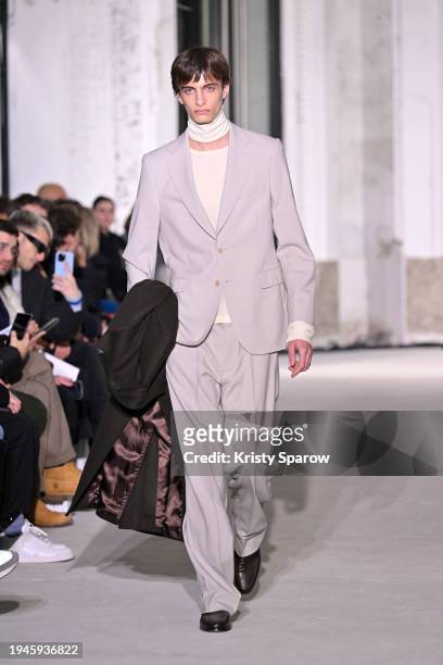 Model walks the runway during the Officine Generale Menswear Fall/Winter 2024-2025 show as part of Paris Fashion Week on January 19, 2024 in Paris,...