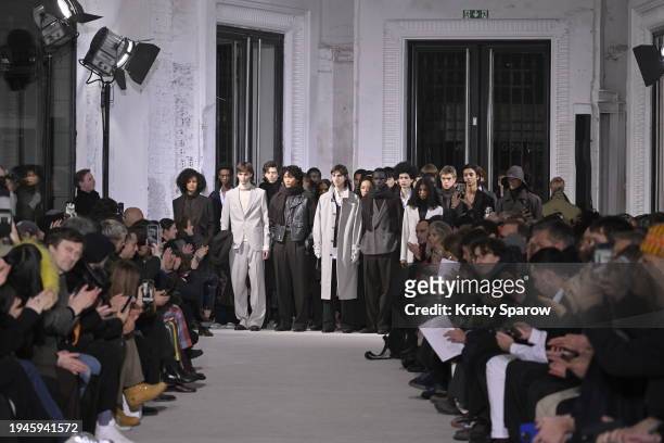 Models pose on the runway during the Officine Generale Menswear Fall/Winter 2024-2025 show as part of Paris Fashion Week on January 19, 2024 in...