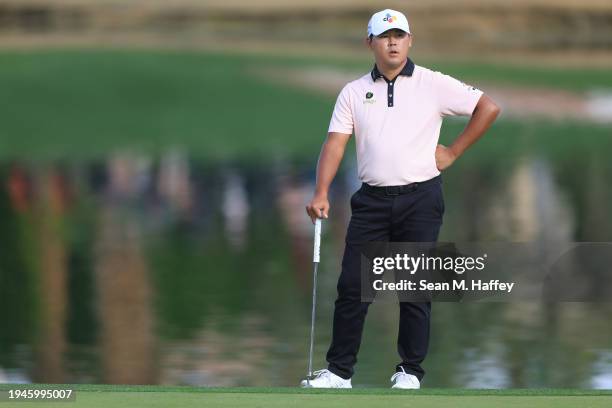 Si Woo Kim of South Korea waits on the 18th green during the second round of The American Express at Nicklaus Tournament Course on January 19, 2024...