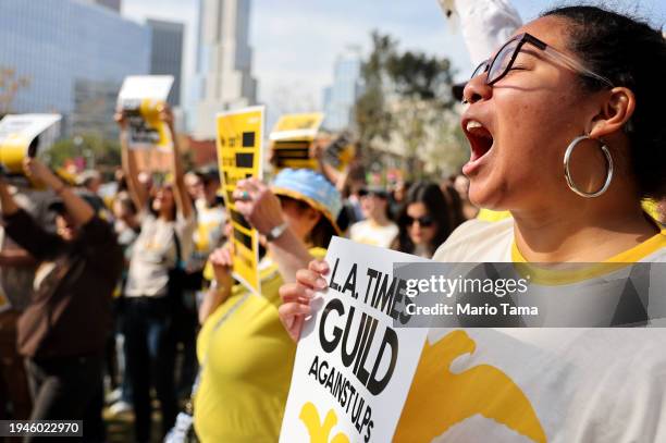 Los Angeles Times Guild members rally outside City Hall against ‘significant’ imminent layoffs at the Los Angeles Times newspaper during a one-day...