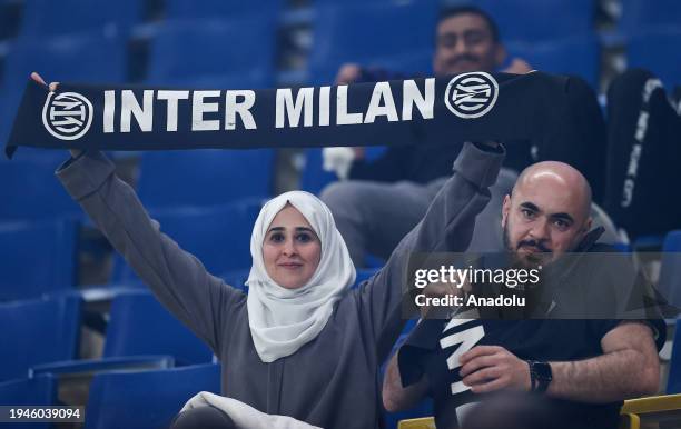 Fan lifts Inter scarf up to show their support during the Italian Super Cup final match between Inter and Napoli at Al -Awwal Stadium in Riyadh,...