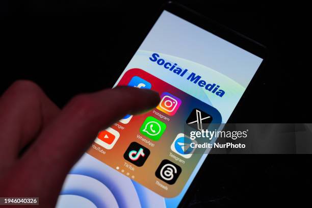 The Instagram logo is being displayed on a smartphone among other social media networks in this photo illustration in Brussels, Belgium, on January...