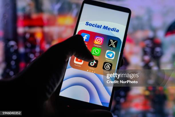 The TikTok app logo is being displayed on a smartphone among other social media networks in this photo illustration in Brussels, Belgium, on January...