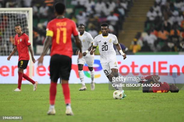 Ghana's midfielder Mohamed Kudus runs with the ball during the Africa Cup of Nations 2024 group B football match between Mozambique and Ghana at...