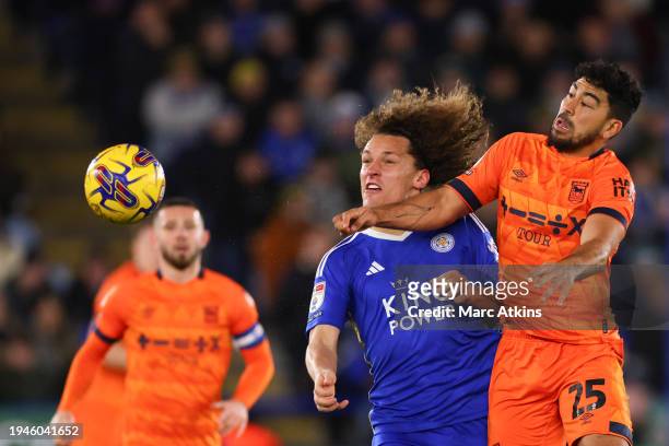 Massimo Luongo of Ipswich Town is shown a Yellow card dfor this challenge on Wout Faes of Leicester City uring the Sky Bet Championship match between...