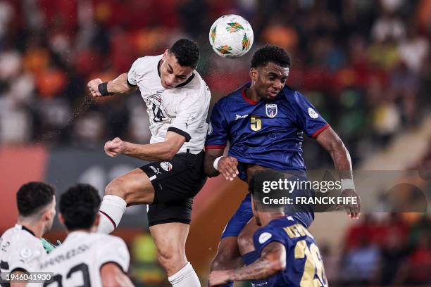Egypt's forward Mostafa Mohamed fights for the ball with Cape Verde's defender Logan Costa during the Africa Cup of Nations 2024 group B football...