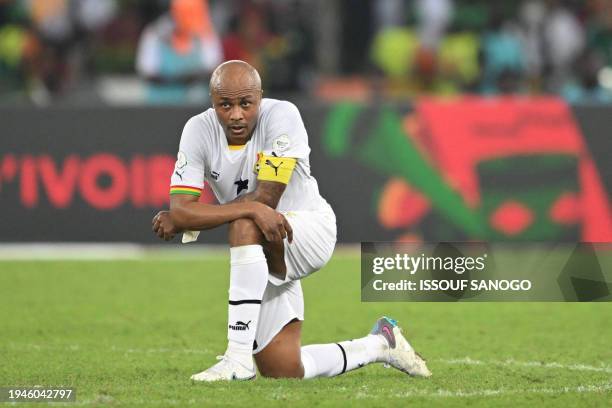 Ghana's midfielder Andre Ayew reacts after the draw between the teams of the Africa Cup of Nations 2024 group B football match between Mozambique and...