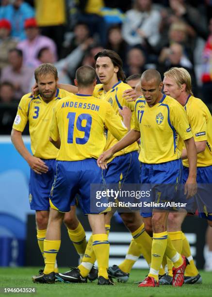 June 14: Olof Mellberg, Daniel Andersson, Zlatan Ibrahimovic and Henrik Larsson of Sweden celebrate during the UEFA Euro 2008 Group D match between...