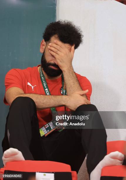 Mohammed Salah of Egypt gestures as he follows the Africa Cup of Nations Group B match between Cape Verde and Egpyt from the bench at Felix Houphouet...