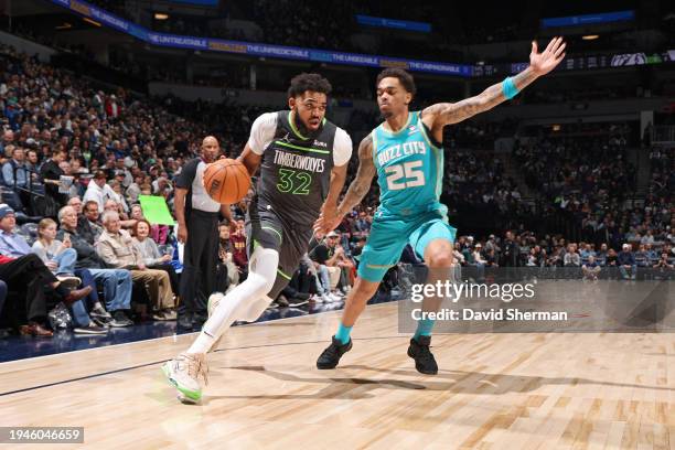 Karl-Anthony Towns of the Minnesota Timberwolves drives to the basket during the game against the Charlotte Hornets on January 22, 2024 at Target...