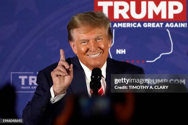 Republican presidential hopeful and former US President Donald Trump gestures as he speaks during a rally in Laconia, New Hampshire, January 22, 2024.