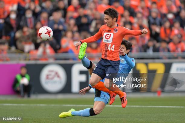 Yusuke Segawa of Omiya Ardija and Shogo Taniguchi of Kawasaki Frontale compete for the ball during the J.League J1 match between Omiya Ardija and...