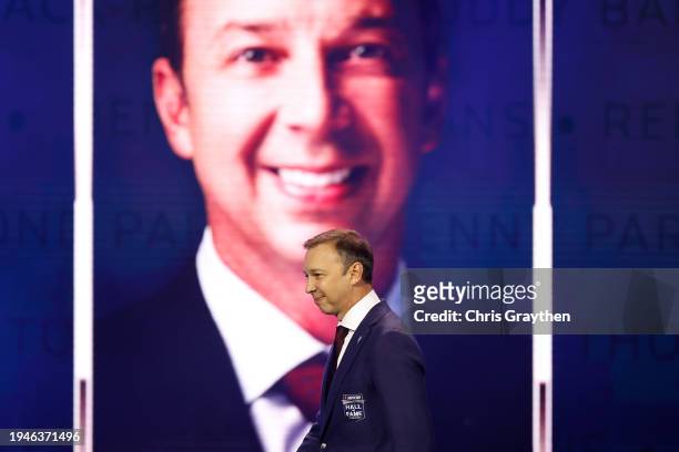 Hall of Fame inductee Chad Knaus walks onstage during the 2024 NASCAR Hall of Fame Induction Ceremony at Charlotte Convention Center on January 19,...