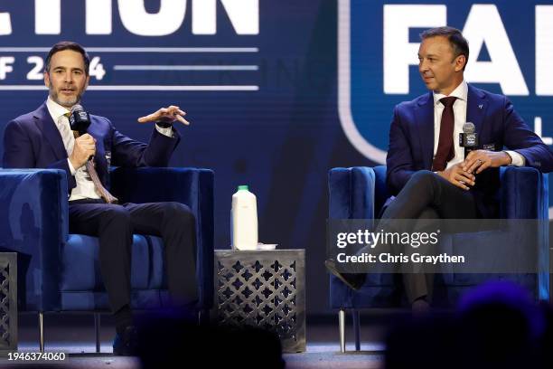 Hall of Fame inductees, Jimmie Johnson and Chad Knaus speak onstage during the 2024 NASCAR Hall of Fame Induction Ceremony at Charlotte Convention...