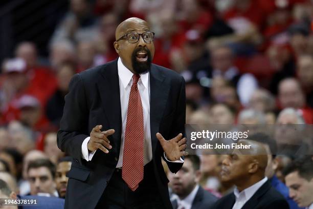Mike Woodson head coach of the Indiana Hoosiers reacts to a call against the Wisconsin Badgers in the first half of the game at Kohl Center on...
