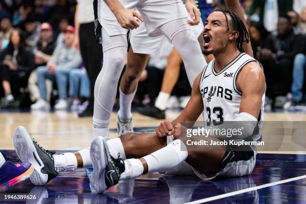 Tre Jones of the San Antonio Spurs reacts in the fourth quarter during their game against the Charlotte Hornets at Spectrum Center on January 19,...