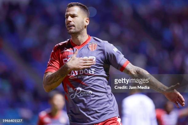 Edgar Mendez of Necaxa celebrates after scoring the team's first goal during the 2nd round match between Puebla and Necaxa as part of the Torneo...