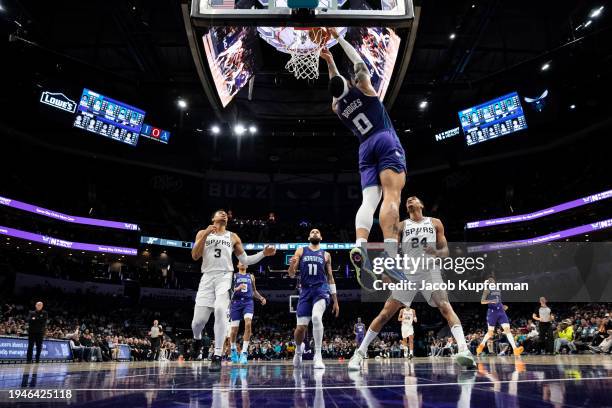 Miles Bridges of the Charlotte Hornets dunks the ball in the third quarter during their game against the San Antonio Spurs at Spectrum Center on...