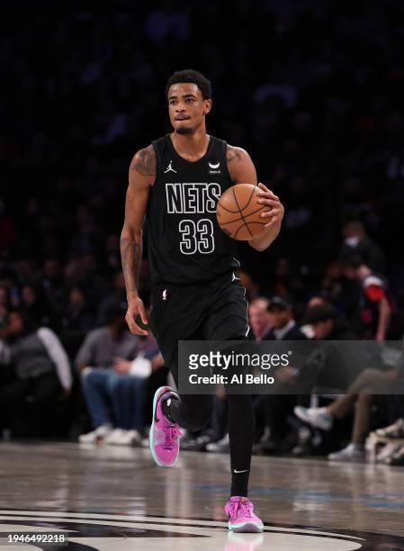 Nic Claxton of the Brooklyn Nets in action against the Miami Heat during their game at Barclays Center on January 15, 2024 in New York City. User...