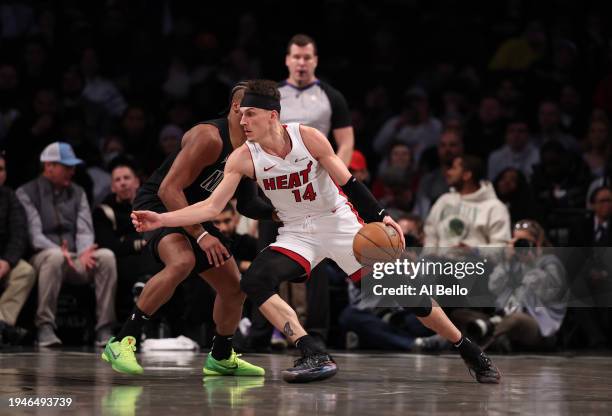 Tyler Herro of the Miami Heat in action against the Brooklyn Nets during their game at Barclays Center on January 15, 2024 in New York City. User...