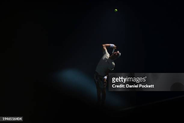 Thanasi Kokkinakis of Australia serves in their round one singles match against Sebastian Ofner of Austria during the 2024 Australian Open at...