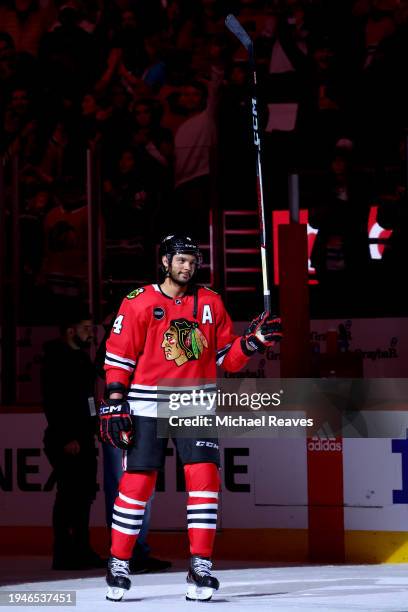 Seth Jones of the Chicago Blackhawks is recognized as a player of the game after scoring the game-winning goal in overtime against the New York...