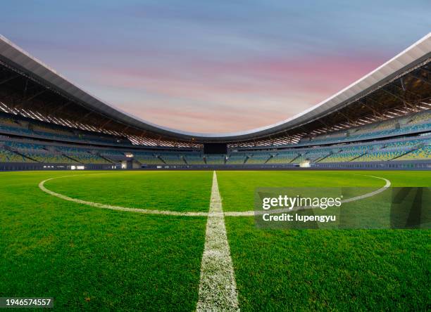 soccer field at sunset - china football stock pictures, royalty-free photos & images