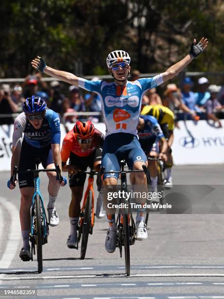 Oscar Onley of United Kingdom and Team dsm-firmenich PostNL celebrates at finish line as stage winner ahead of Stephen Williams of United Kingdom and...