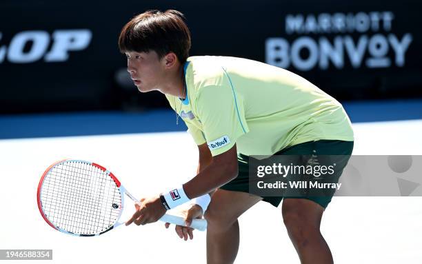 Jangjun Kim of South Korea in 2nd round men's junior doubles match against Kaylan Begun of USA and Jagger Leach of USAduring the 2024 Australian Open...